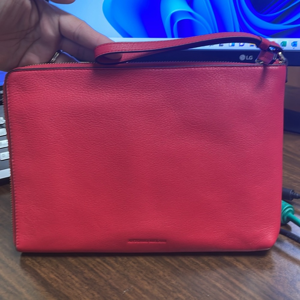 Red Leather zipped Wristlet. 10 X 7.5 inches.